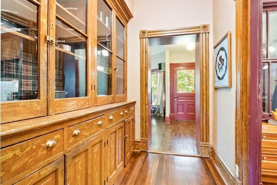 The Butler’s Pantry leads to the fully equipped kitchen