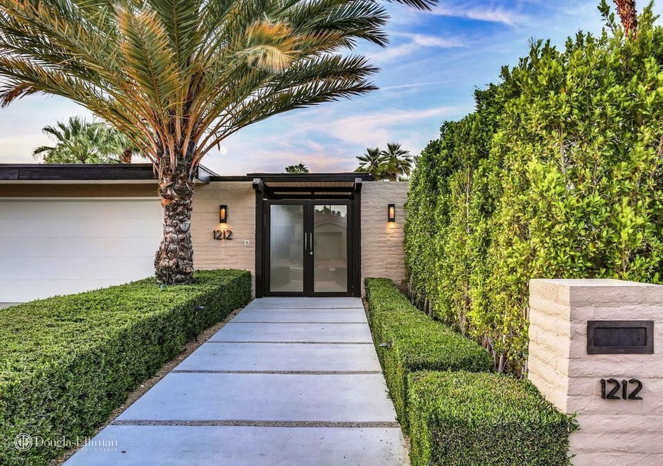 Front Gate and Ficus Covered Hedge provides ultimate privacy