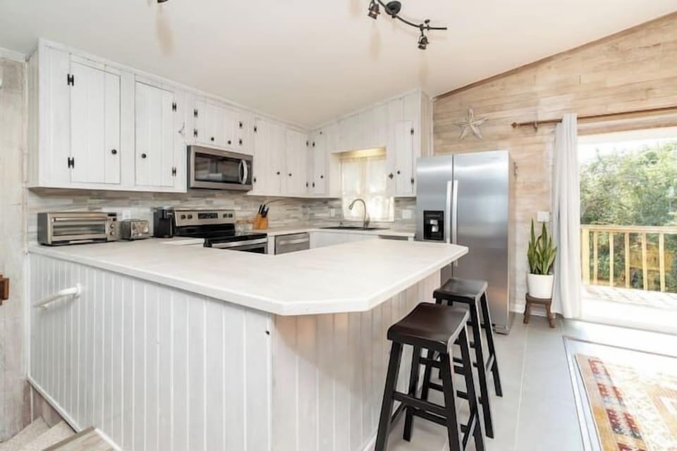 Fully equipped kitchen with everything you'll need to cook a meal