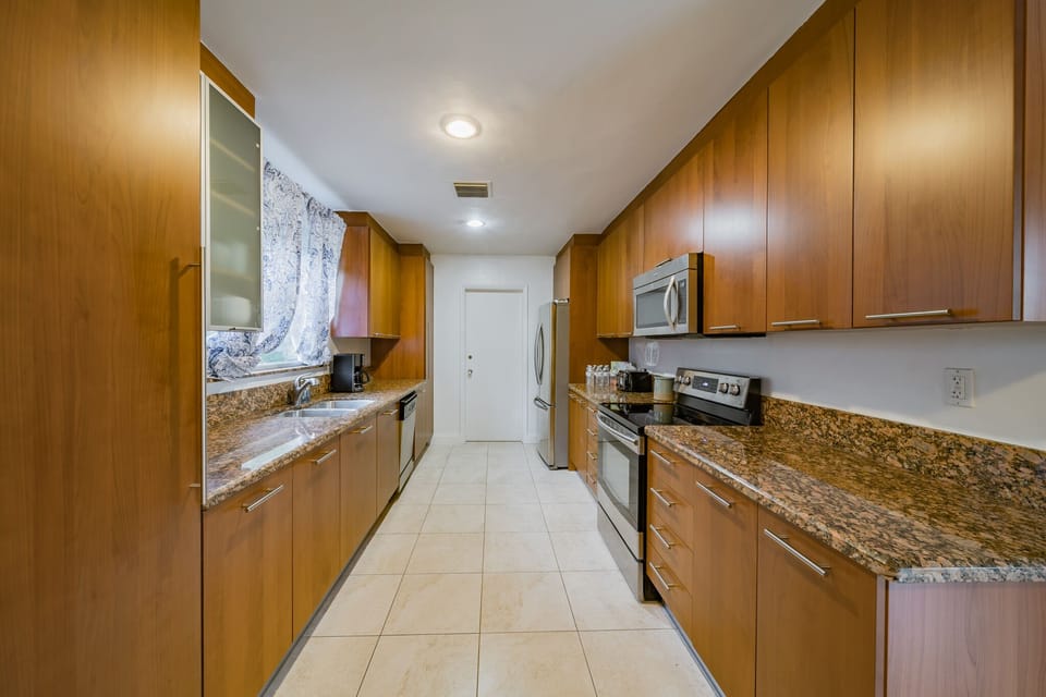Kitchen:
View of Sink, Refrigerator, Stove, Microwave, Cabinetry