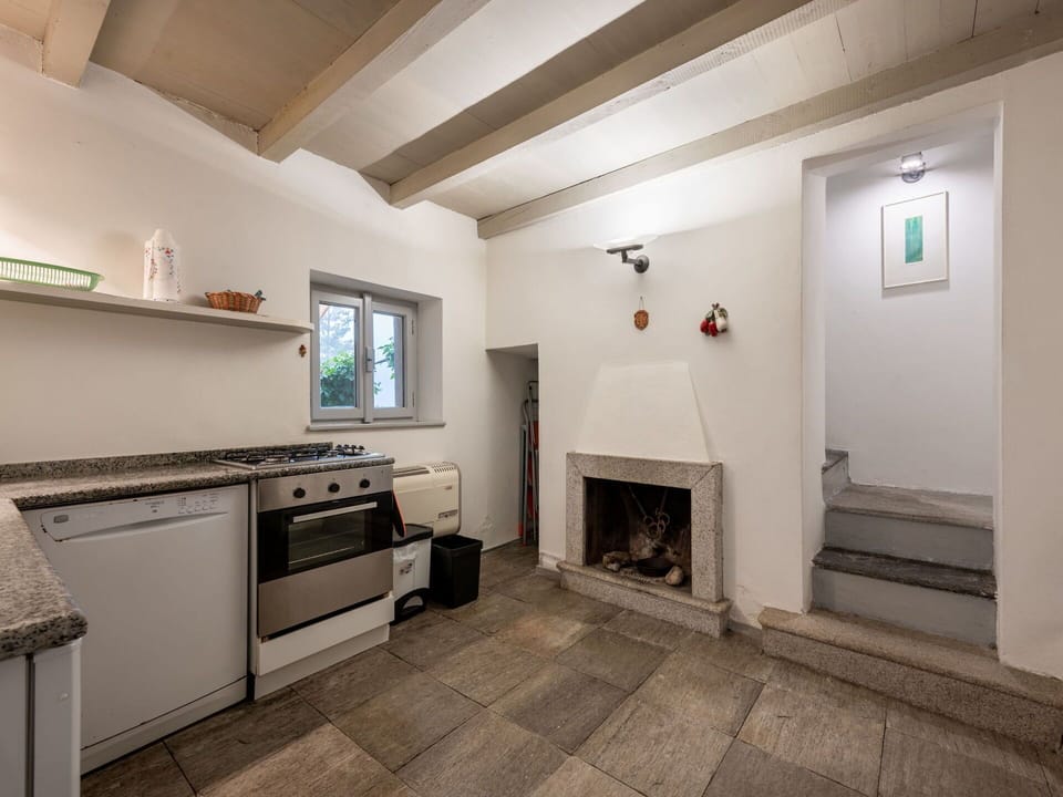 Property, Picture Frame, Cabinetry, Wood, Interior Design, Gas Stove, Floor, Flooring, Kitchen Appliance