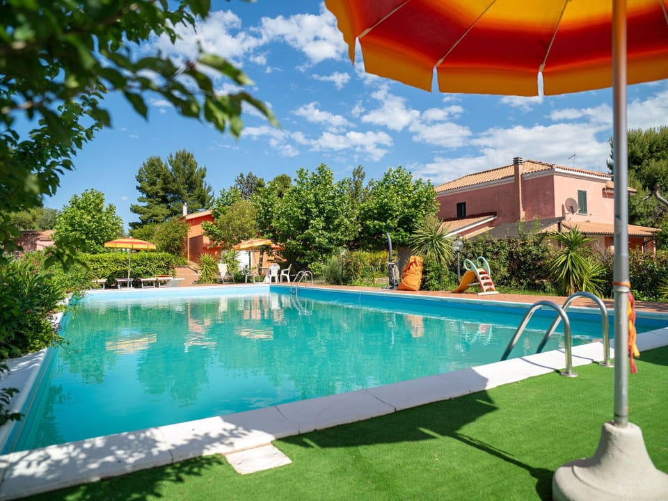 Water, Sky, Plant, Cloud, Property, Building, Swimming Pool, Green, Azure, Shade