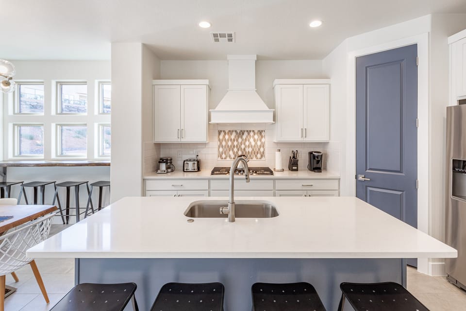 Kitchen - The kitchen is fully stocked with all the dishes, cookware, baking pans, and cutlery you will need for meal preparations and includes stainless steel appliances and granite counter tops.