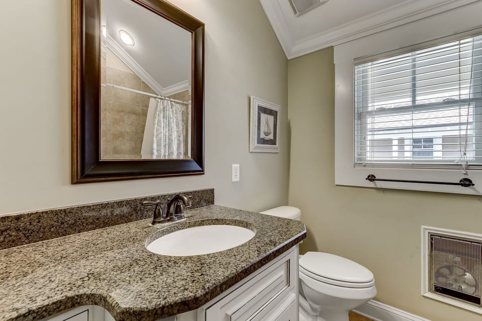 Bathroom 2 with Granite Countertops and Combination Bathtub/Shower