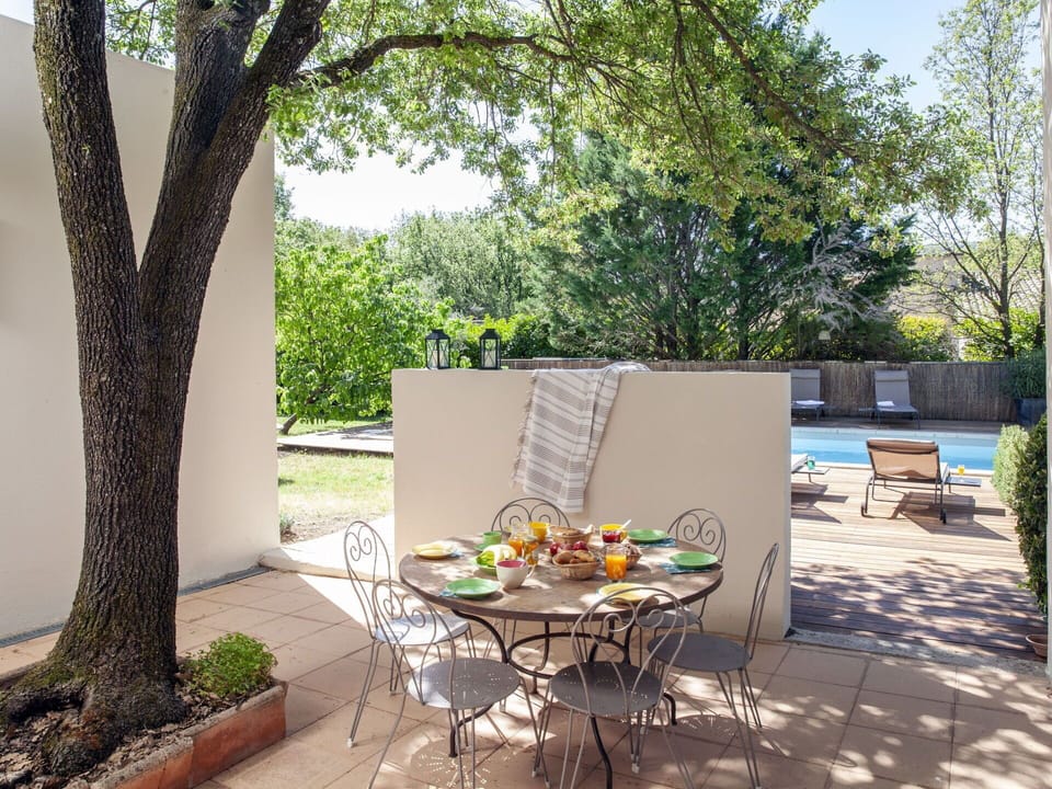 Plant, Table, Furniture, Chair, Shade, Tree, Outdoor Furniture, Interior Design, Wood, Sky
