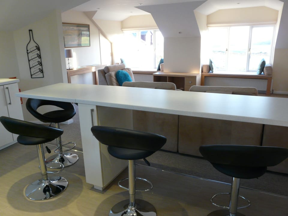 Kitchen breakfast area and part of the living area