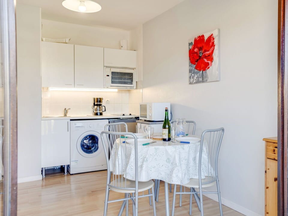 Furniture, Table, Cabinetry, Building, Chair, Interior Design, Countertop, Wood, Flooring, Floor