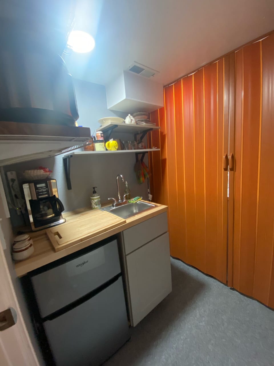 Kitchenette w/coffee pot, instapot, toaster, microwave, blender and utensils.