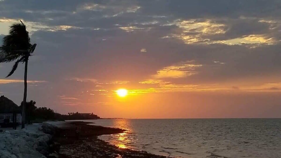 Take in breathtaking sunsets from the beach.