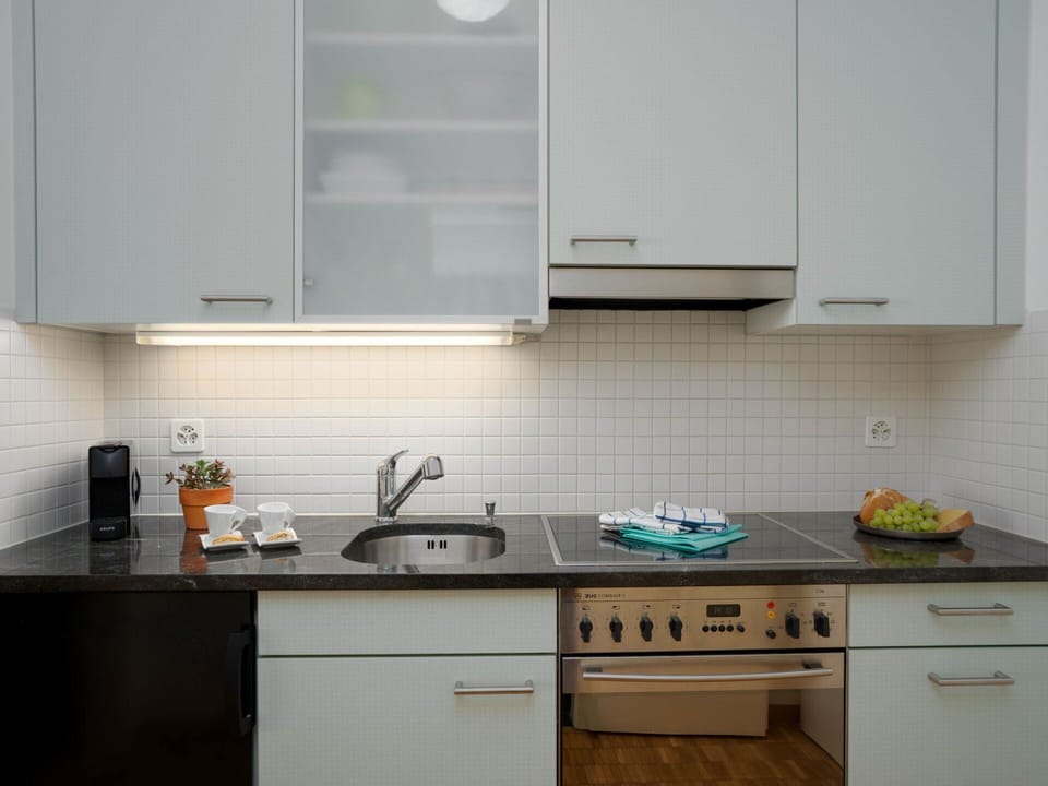 Kitchen, Countertop, Kitchen Appliance, Cabinetry, Kitchen Sink, Interior Design, Wood, Major Appliance, Sink, Flooring