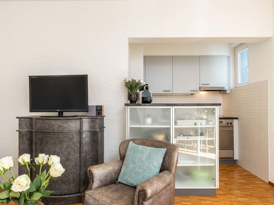 Furniture, Interior Design, Flooring, Wall, Floor, Wood, Ceiling, Room, Couch, Lighting