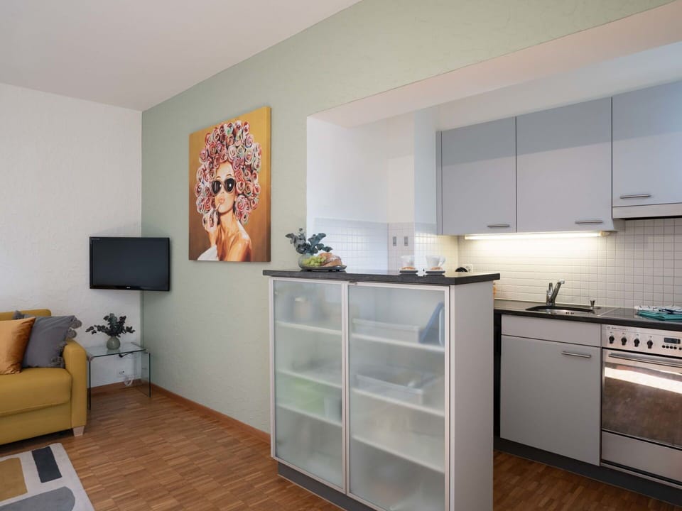 Furniture, Interior Design, Flooring, Floor, Wood, Room, Cabinetry, Ceiling, Lighting, Home