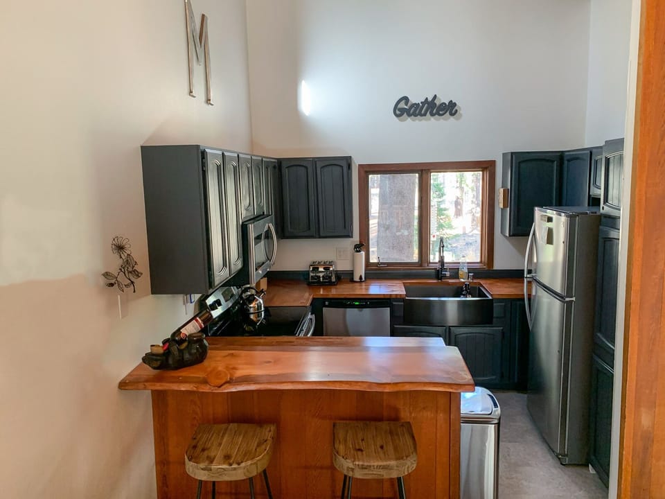 Fresh Painted Cabinets, New Butcher Block countertops and a Brand New Sink!