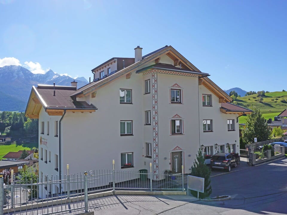 Sky, Building, Property, Window, House, Architecture, Plant, Mountain, Urban Design, Neighbourhood