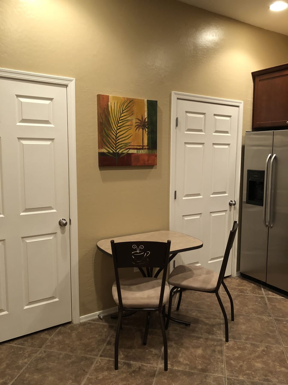 Kitchen table with two chairs.