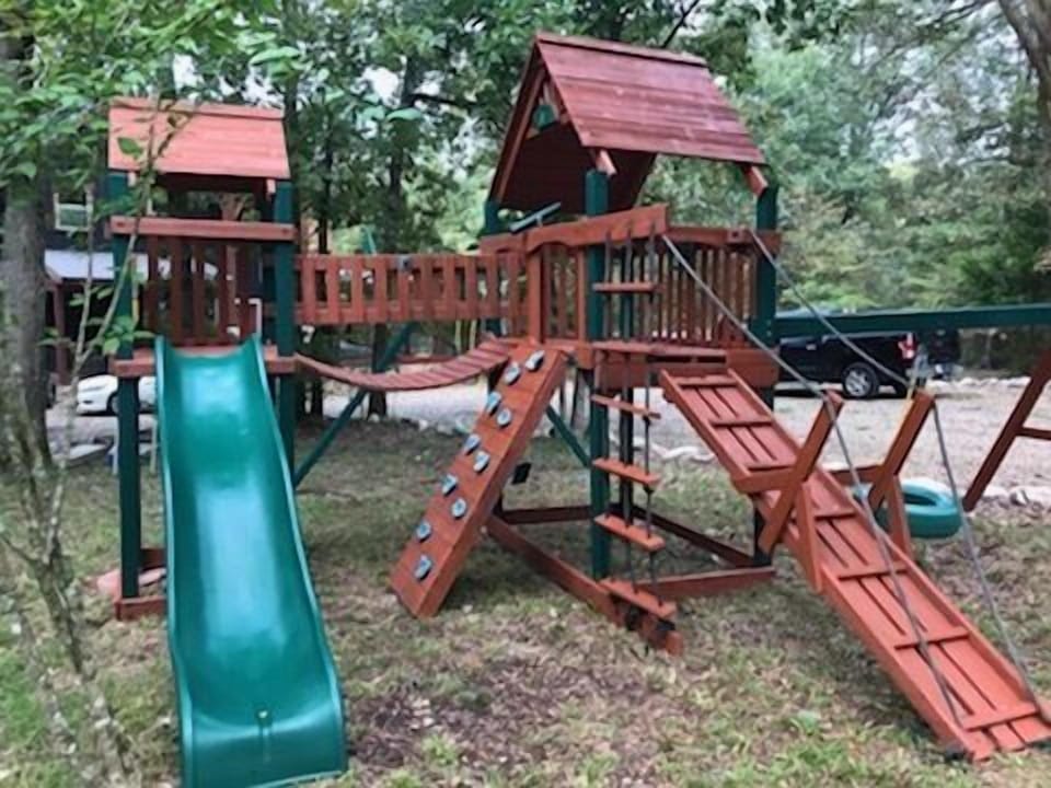 Sliding or climbing, the cabin's play set is the best way to let the kiddos run off their energy!