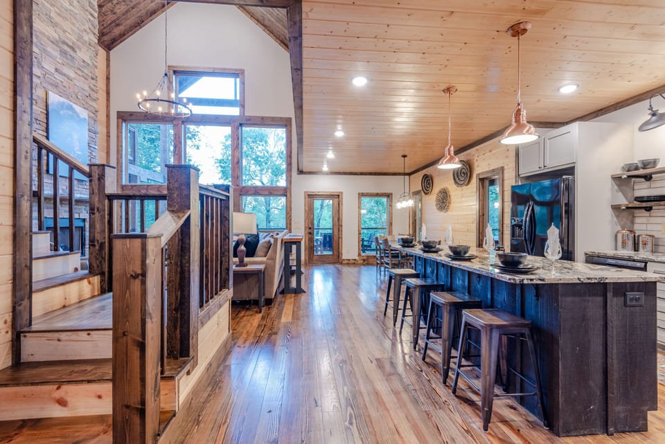 Being in the kitchen doesn't mean having to miss the fun with this cabin's open layout.