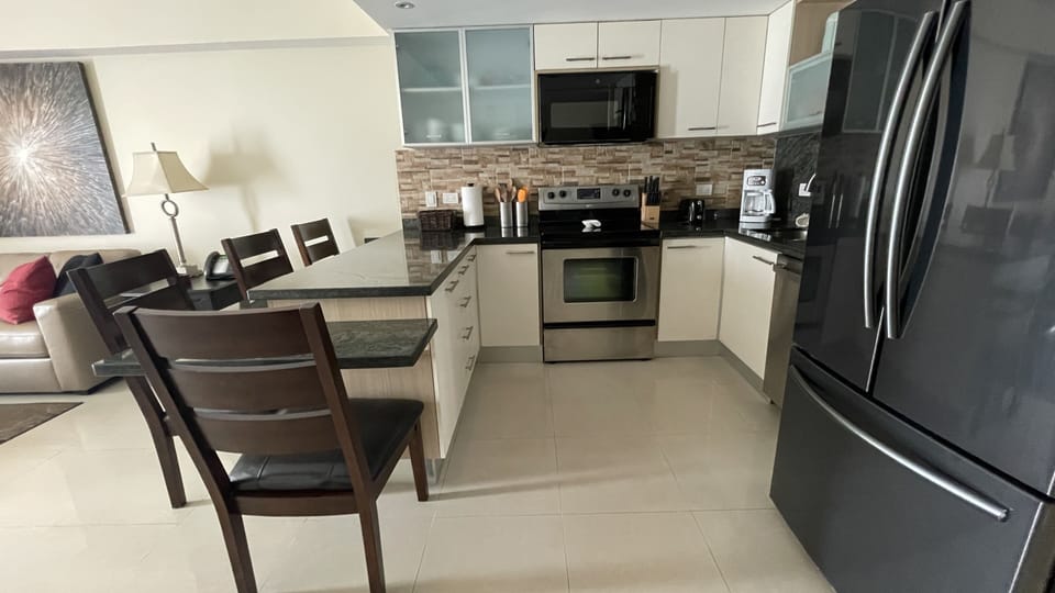 Kitchen with full size appliances and dining area