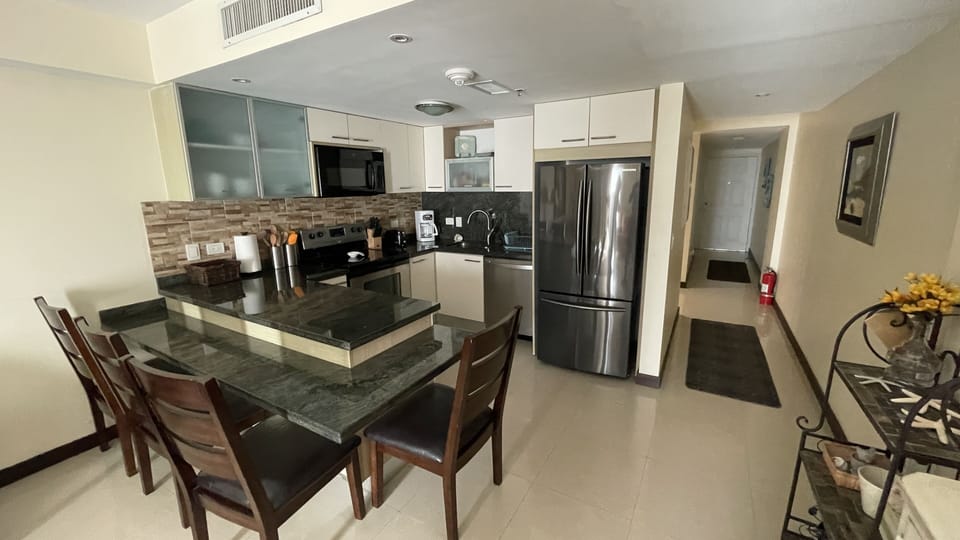 Fully stocked Kitchen with dining area - just bring food