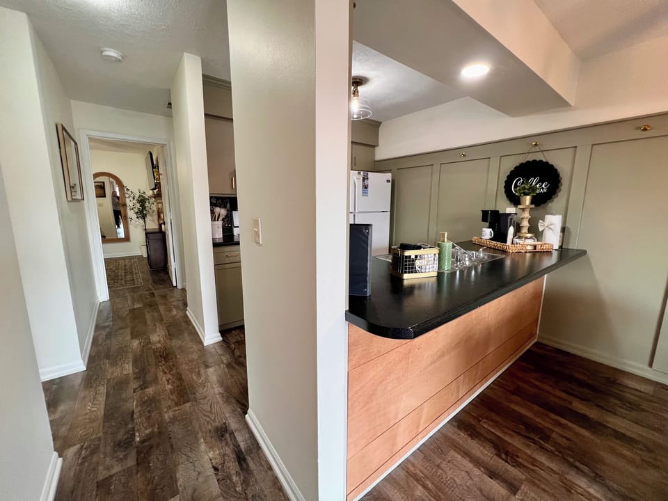 Island open to living room and dining