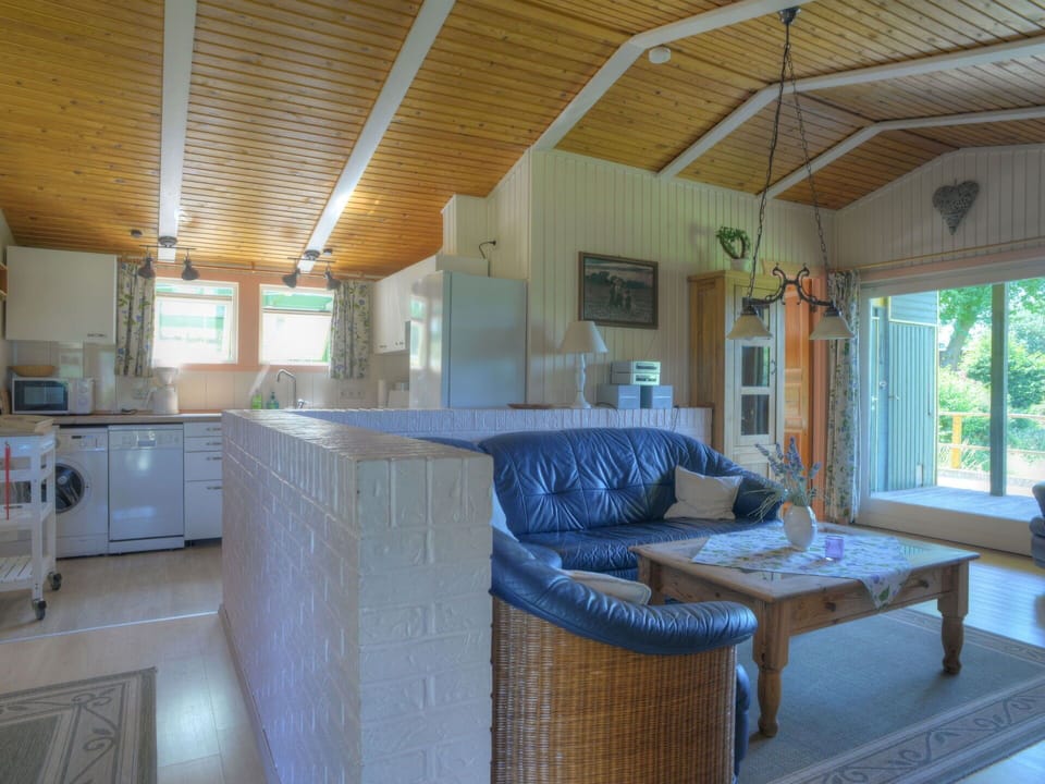 Cabinetry, Wood, Countertop, Building, Interior Design, Shade, Kitchen Appliance, Living Room, Floor, Window