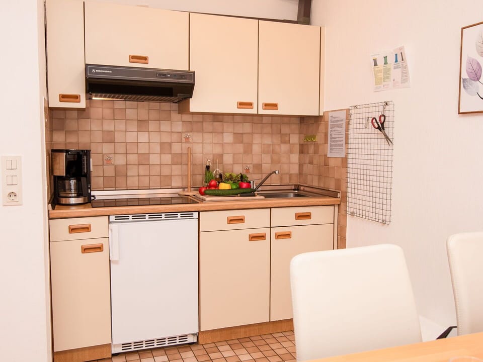Cabinetry, Countertop, Kitchen Sink, Kitchen Stove, Sink, Building, Kitchen Appliance, Kitchen, Interior Design, Wood