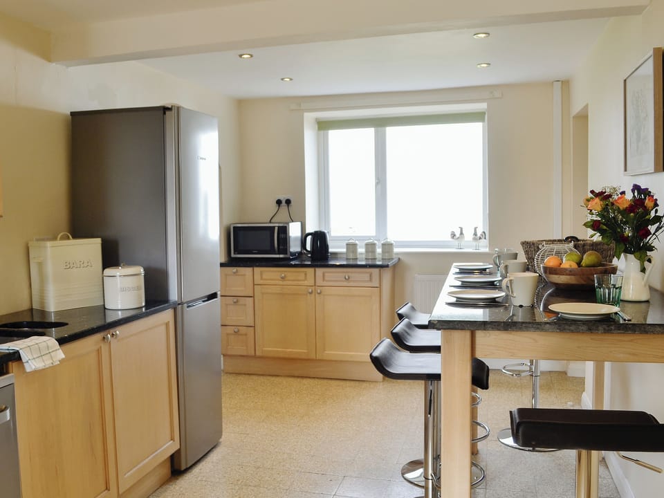 Well equipped kitchen with breakfast bar area | Bryn Boda, Nantglyn, near Denbigh