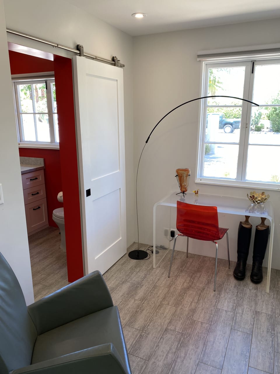 Red room sitting/closet area w Red bath to left
