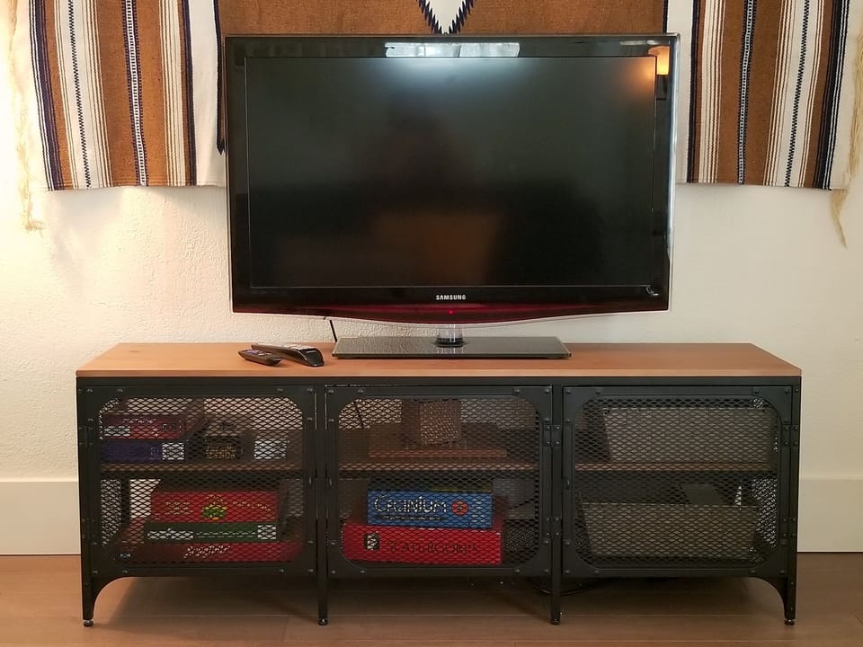 Samsung TV with Roku remote for streaming your favorite TV shows and movies