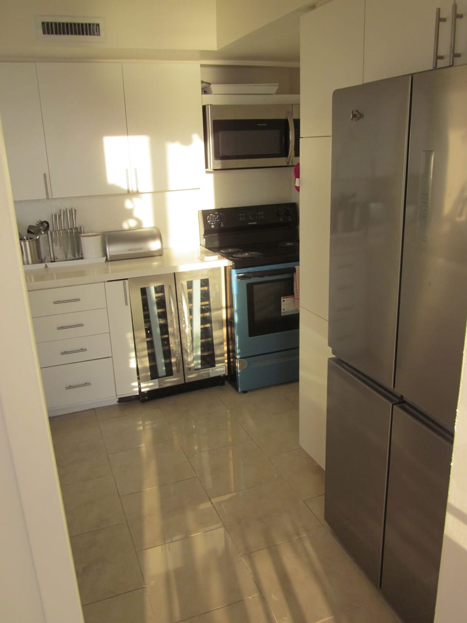 Clean kitchen with wine cooler