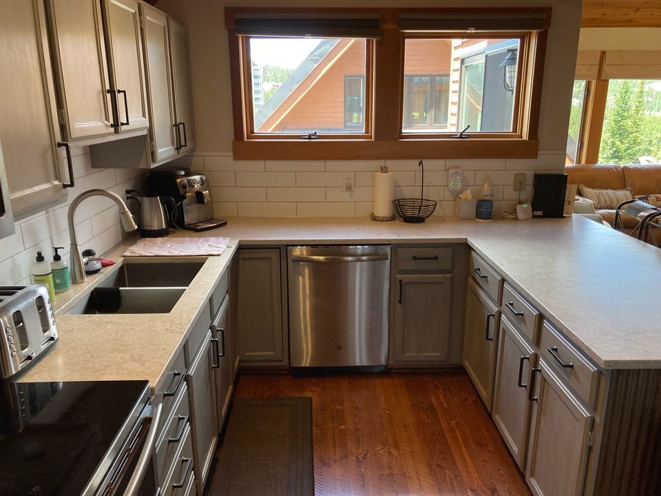 Kitchen with dishwasher and disposal