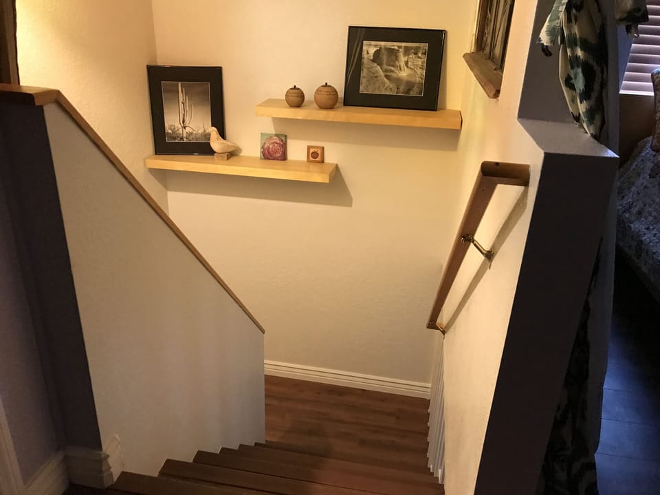 stairs leading up to 3rd bedroom