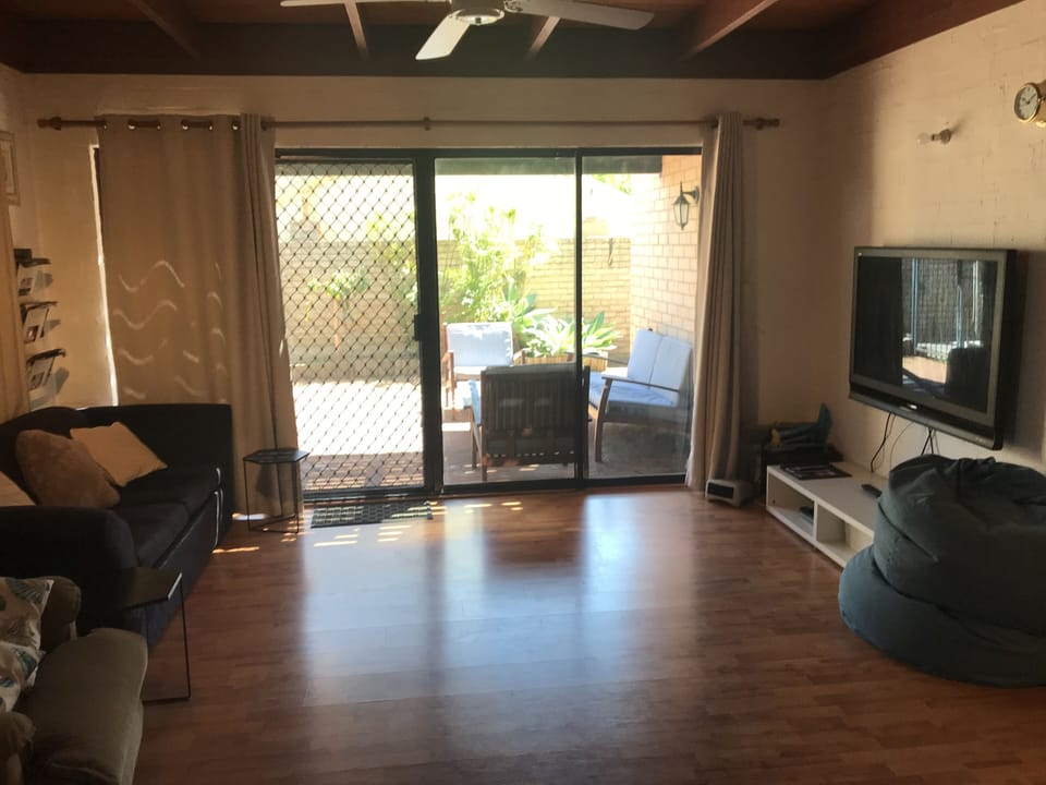 Large living area leading to private courtyard