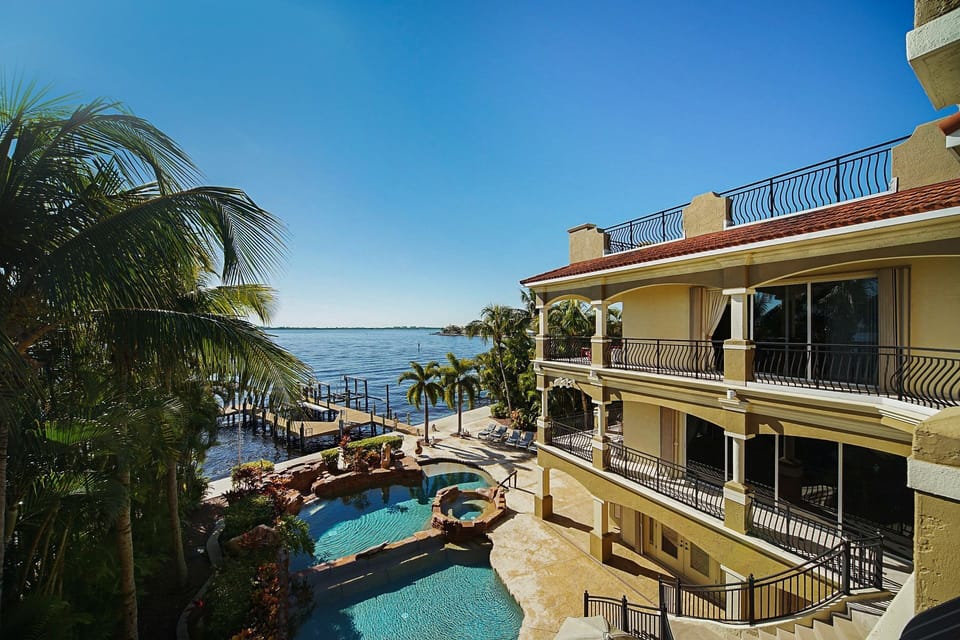 A resort-feel view of the pool and river