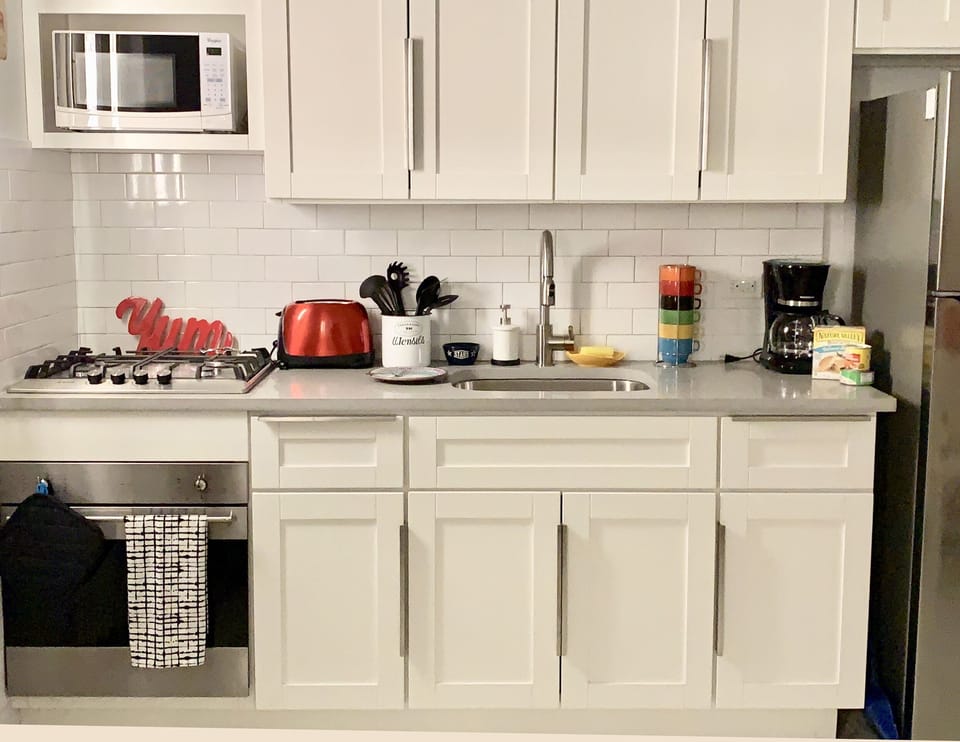 fully remodeled kitchen with all new appliances, including coffee maker & kettle