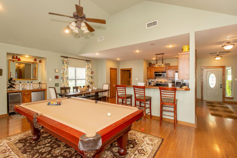 The pool table is a great spot to gather with your guests and enjoy!