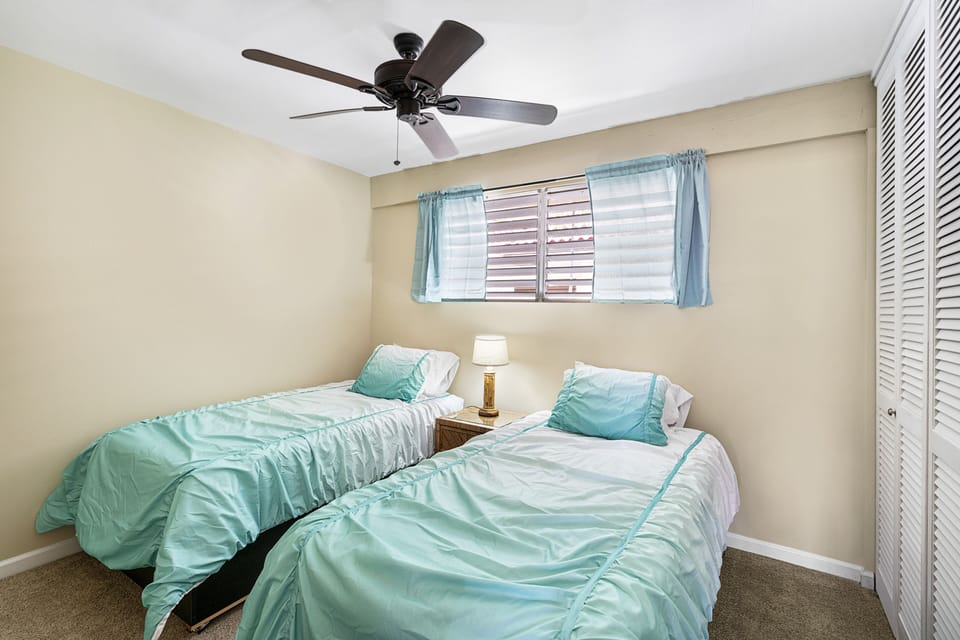 The 2nd Bedroom! It features 2 twin beds.