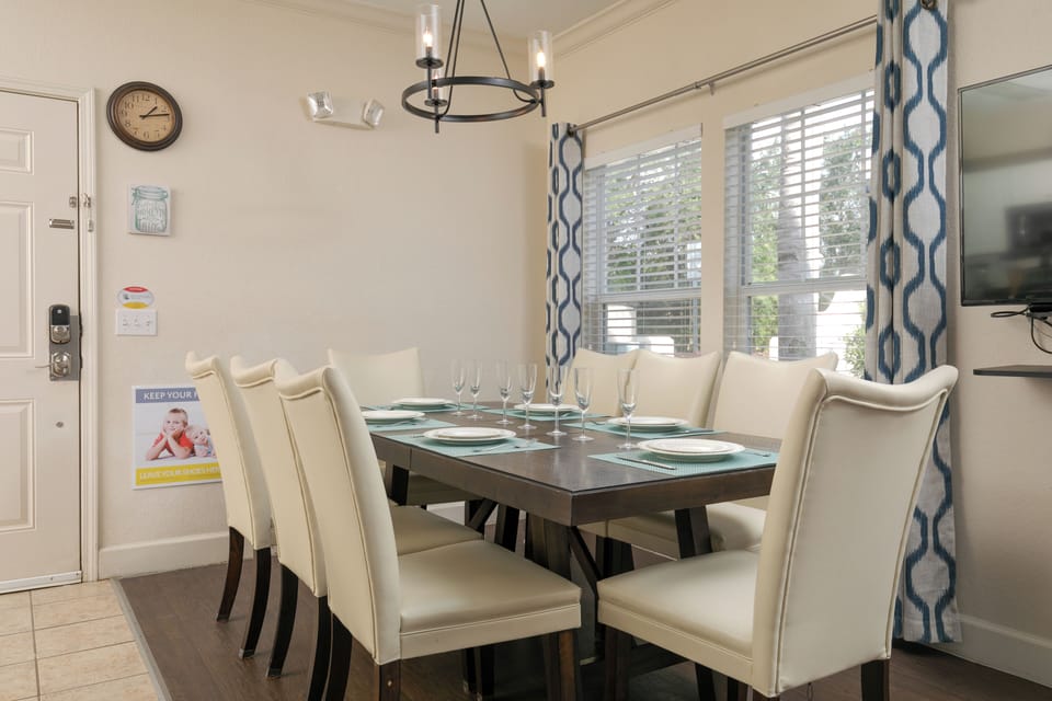 Dining table with excellent lighting enhances the ambiance for enjoyable meals.
