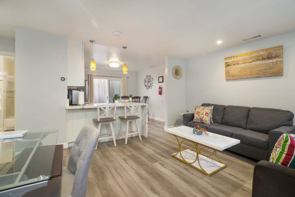 Relax in the comfort of this living room after a day at the Beach. Permit #str14-0085 