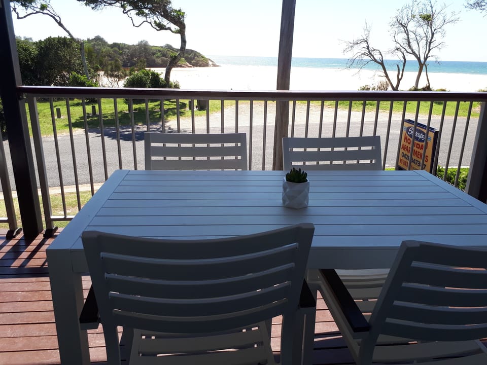 Balcony overlooking lake and ocean