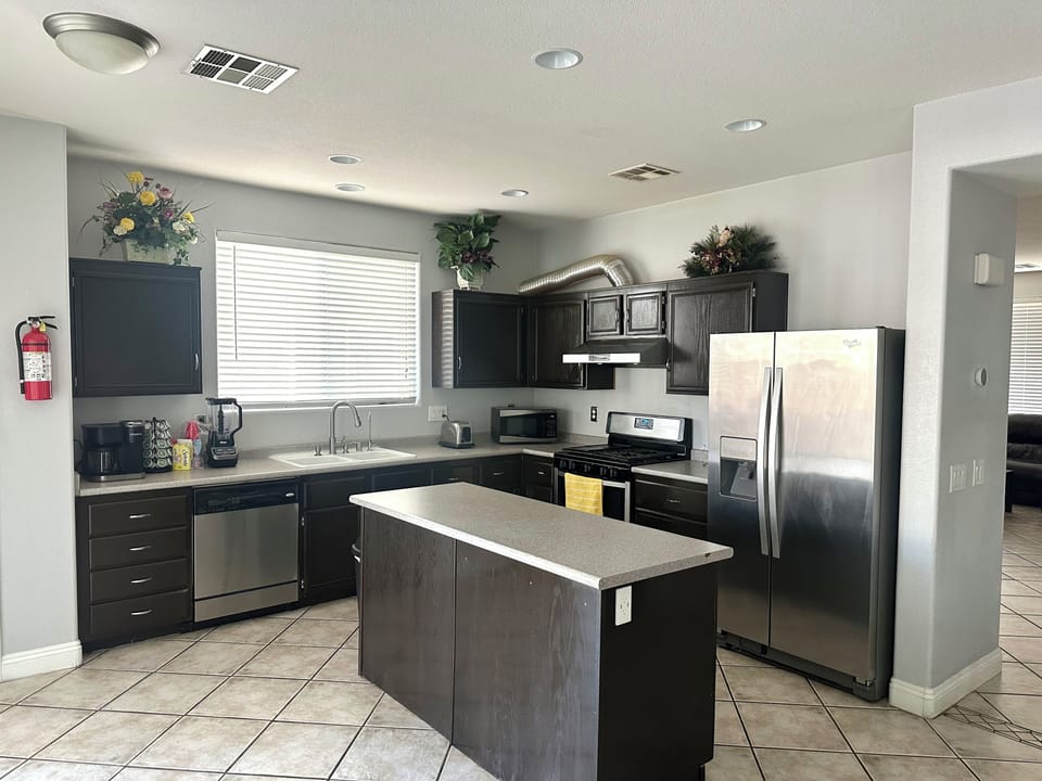 Kitchen with Essential Equipment and Utensils