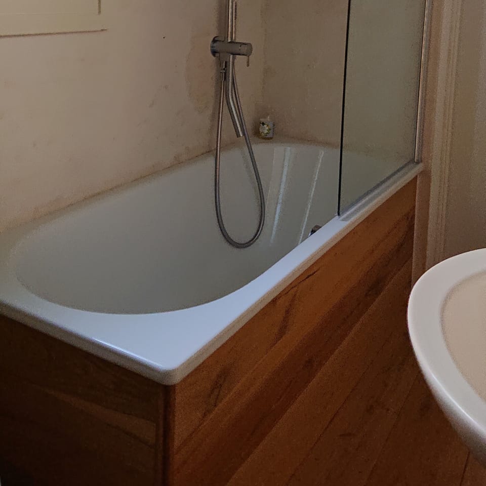 bathtub with shower