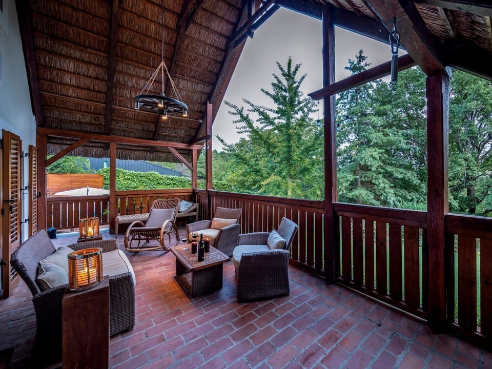 Large balcony under the thatched roof