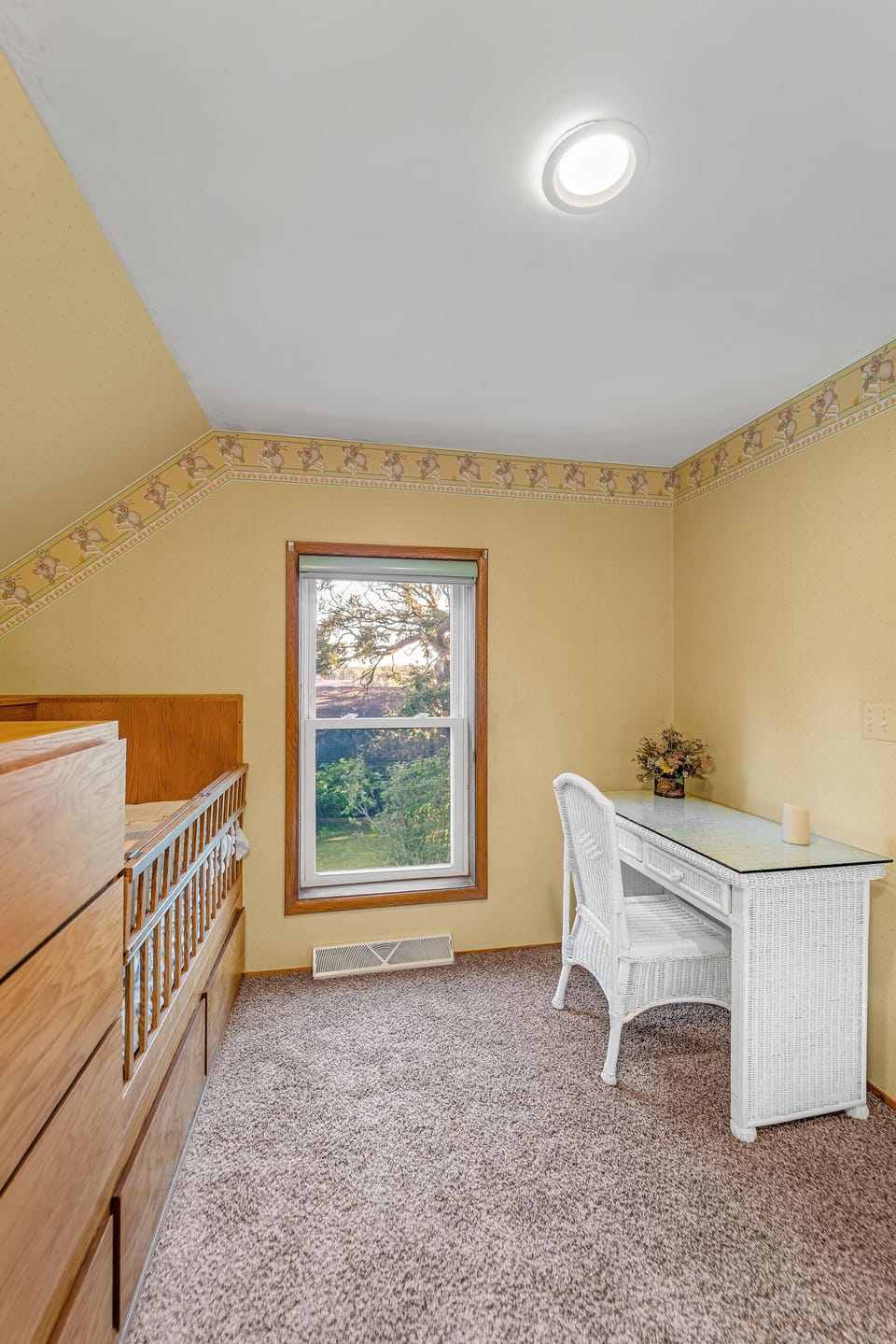 Crib, baby changing station and desk. 