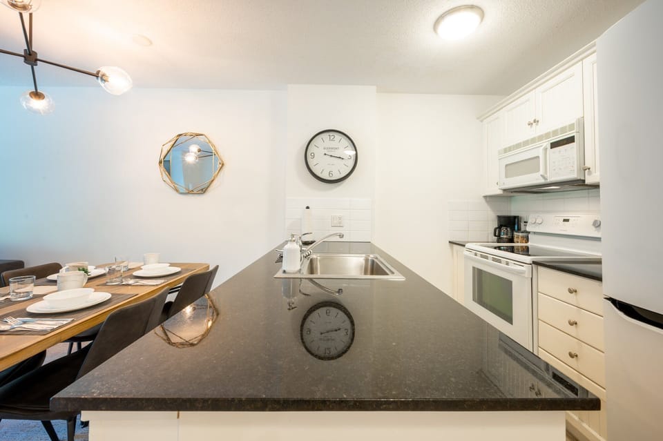 Kitchen - fully stocked with cooking basics and coffee, tea, and hot chocolate. Ideal for those who are not looking to eat out every meal!