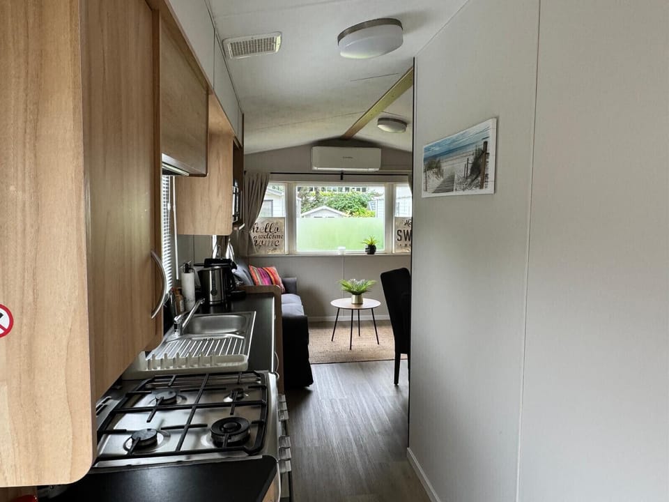 Kitchen and living room of vacation park Kijkduin - 814