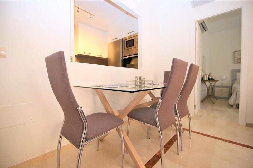 Dining area off the lounge with seating for four guests