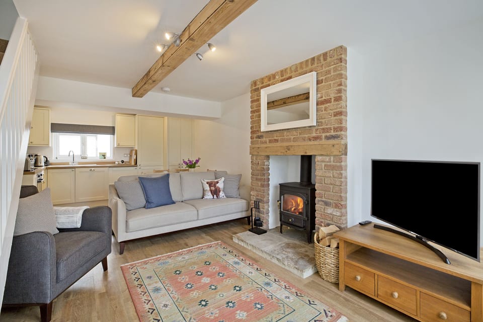 Log-burning stove in Nidd View holiday cottage in Cattal, North Yorkshire