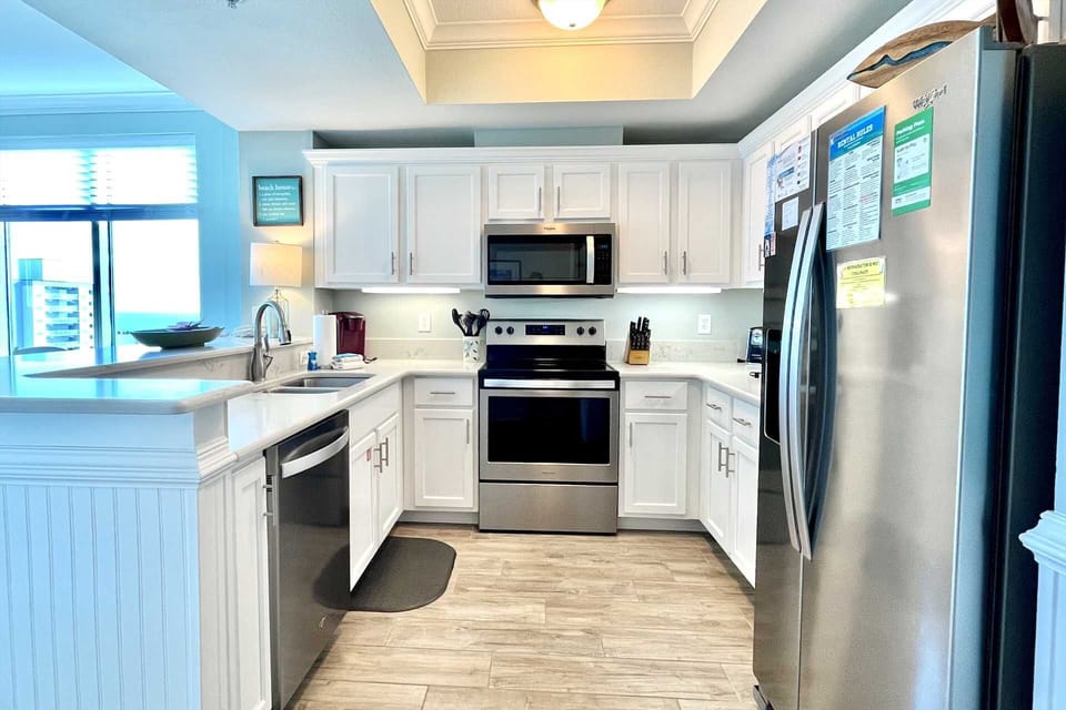 Completely renovated kitchen. Well-appointed with cookware, drinkware, & essentials.