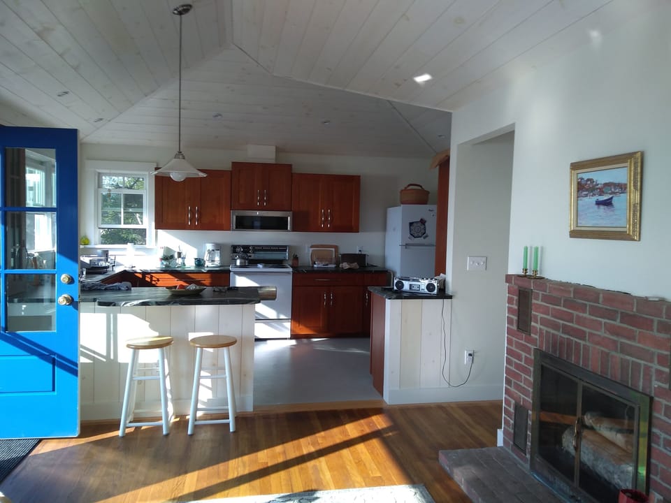 open floor design to kitchen from dining area
